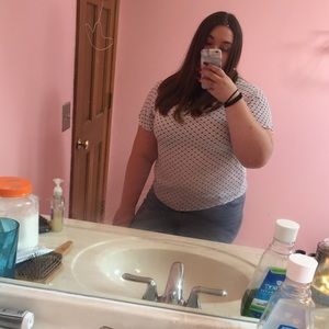 White blouse with black diamond pattern